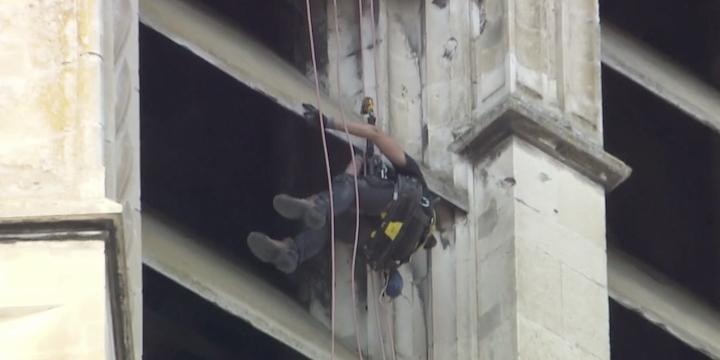 In the air, suspended from a rope, the rope access technicians have chosen a risky profession